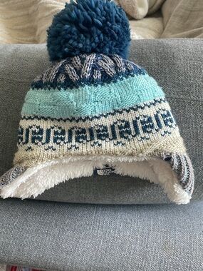 The North Face Kids Pom-Pom Earflap Beanie in Teal, Navy & Cream